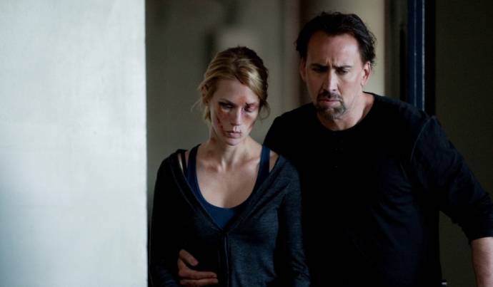 January Jones (I) (Laura Gerard) en Nicolas Cage (Will Gerard)