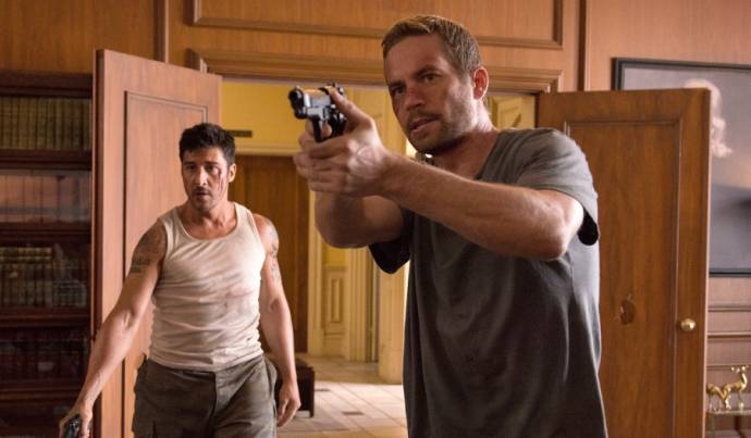 David Belle (Lino) en Paul Walker (Damien)