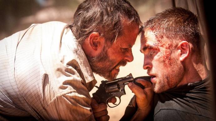 Guy Pearce (Eric) en Robert Pattinson (Reynolds)