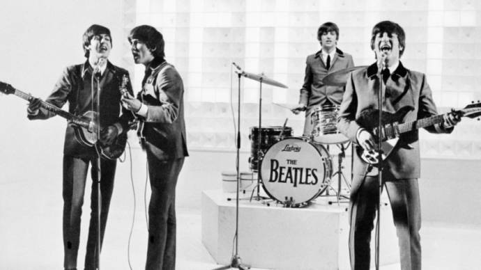 Paul McCartney (Paul), George Harrison (George), Ringo Starr (Ringo) en John Lennon (John)