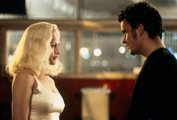 Patricia Arquette (Renee Madison / Alice Wakefield) en Balthazar Getty (Pete Dayton)