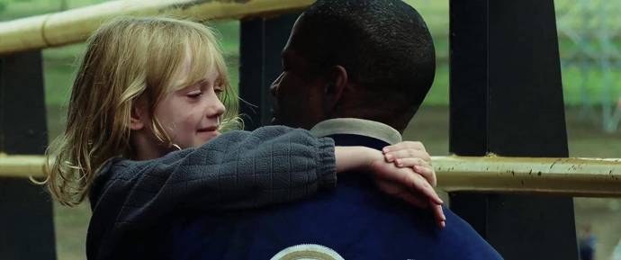 Dakota Fanning (Pita) en Denzel Washington (Creasy)