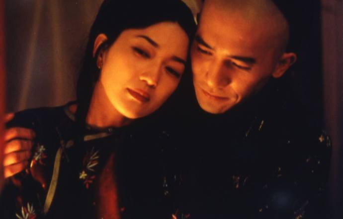 Michelle Reis (Emerald) en Tony Leung Chiu-wai (Wang)