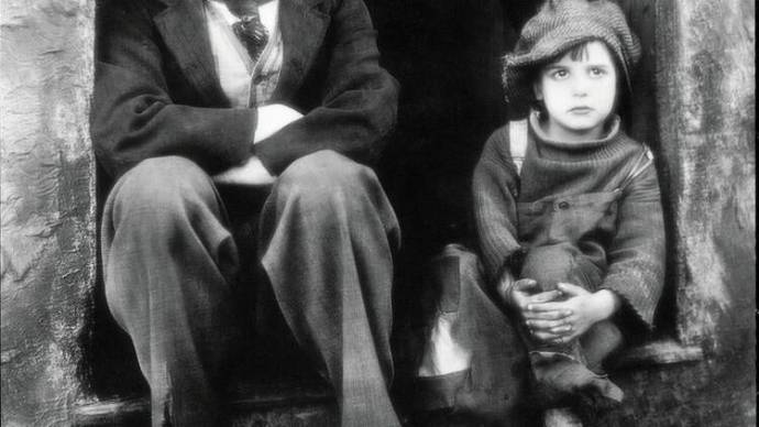 Charles Chaplin (Tramp) en Jackie Coogan (The Kid (as Jack Coogan))