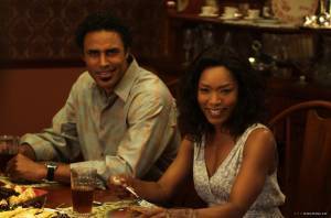 Angela Bassett (Brenda) en Rick Fox (Harry)