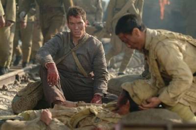 Jonathan Rhys-Meyers (George Hogg) en Chow Yun-Fat (Chen Hansheng)