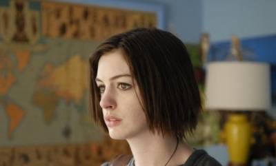 Anne Hathaway (Kym)