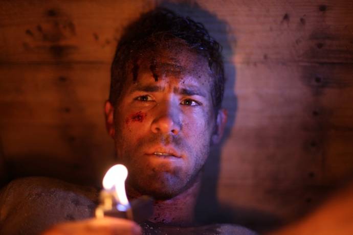 Ryan Reynolds (Paul Conroy)