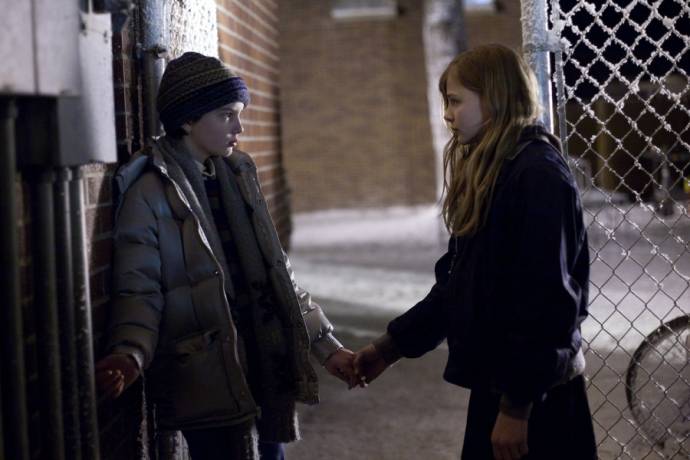 Chloë Grace Moretz (Abby) en Kodi Smit-McPhee (Owen)