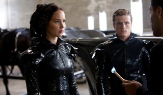 Jennifer Lawrence, Josh Hutcherson en Lenny Kravitz in The Hunger Games