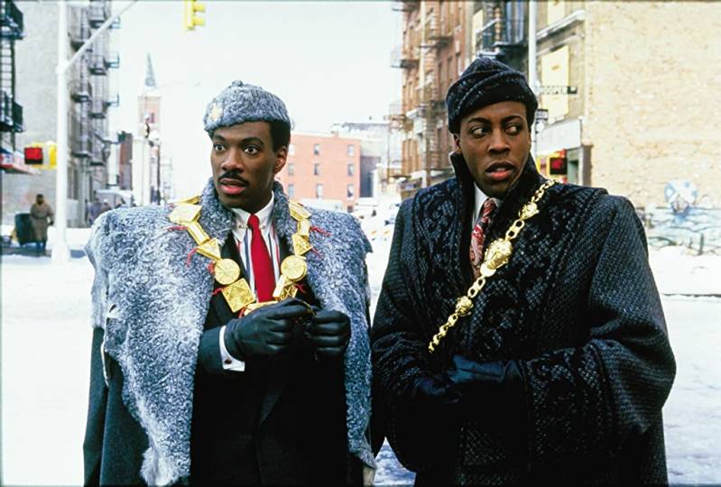 Eddie Murphy en Arsenio Hall in Coming to America (1988)